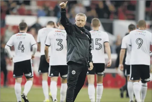  ?? PICTURES: SIMON BELLIS/SPORTIMAGE ?? PROPER GROUND: Sheffield United’s Chris Wilder acknowledg­es the away fans after last year’s encounter at Nottingham Forest’s City Ground.