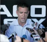  ?? CHARLES REX ARBOGAST — THE ASSOCIATED PRESS ?? Chicago Cubs president of baseball operations Theo Epstein talks to reporters about acquiring closer Aroldis Chapman on Monday.