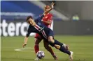  ??  ?? PSG’s Ander Herrera tumbles as he contests possession with Bayern’s Thiago Alcântara. Photograph: Matthew Childs/AP