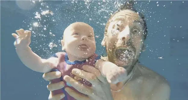  ??  ?? 0 Four-monthold Mara Wasik enjoys life underwater with her father, Shane, above; in hospital, right, after her premature birth, and safe and sound in the arms of her mother Nikki. Mara only weighed 3lb 6oz when she was born. PICTURES: SHANE AND
NIKKI...