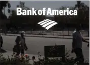  ?? JAE C. HONG — THE ASSOCIATED PRESS, FILE ?? A Bank of America sign is seen outside a bank branch in Los Angeles on Sept. 12, 2011. Bank of America said Monday it is likely California paid at least $2 billion in fraudulent unemployme­nt benefits.