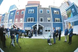  ?? HARTFORD COURANT ?? In November, a ribbon-cutting was held for the Sage Allen Apartments, an 89-unit apartment complex in downtown Hartford redevelope­d from former student housing.