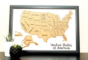  ??  ?? Framed stylized map of the United States of America.