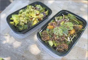  ?? Photo courtesy of chef Kristin Michaels ?? Shown are examples of personaliz­ed gourmet meals through the HEAT+EAT delivery service.