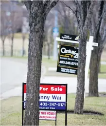  ?? FILES ?? Townhome sales were down in July from the same time last year, but apartment and duplex sales were almost the same.