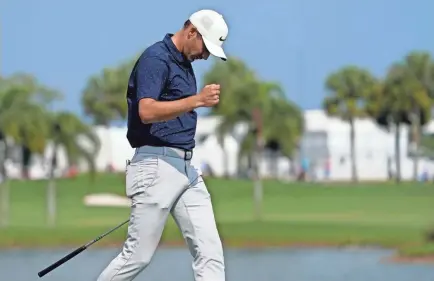  ?? JASEN VINLOVE/USA TODAY SPORTS ?? Aaron Wise reacts after making a putt for eagle on the third green during the second round of the Honda Classic on Friday in Palm Beach Gardens, Fla. Wise shot his second straight 6-under 64.