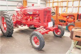  ??  ?? Two of the tractors that will be sold.