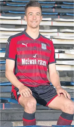  ?? Picture: David Young. ?? Vice-captain Cammy Kerr models Dundee’s new away kit at Dens Park yesterday.