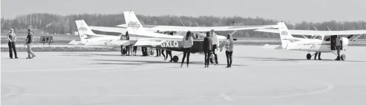  ?? [ALI WILSON / THE OBSERVER] ?? Girls and young women attended the annual Girls CAN Fly! event promoting women in aviation May 13 at the Region of Waterloo Internatio­nal Airport.