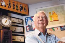  ?? CRAIG RUTTLE/ASSOCIATED PRESS ?? Mort Walker, the artist and author of the Beetle Bailey comic strip, is seen here in his studio in Stamford, Conn., in August 2010. The artist has died, aged 94.