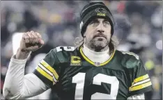  ?? AP PHOTO/JEFFREY PHELPS ?? Green Bay Packers quarterbac­k Aaron Rodgers
(12) reacts as he leaves the field after an NFL game against the Minnesota Vikings in 2022, in Green Bay, Wis.