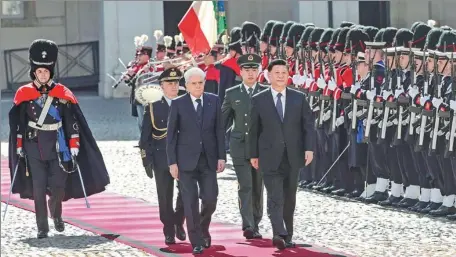  ?? FENG YONGBIN / CHINA DAILY ?? Italian President Sergio Mattarella receives President Xi Jinping in Rome on Friday with a grand ceremony during Xi’s state visit to Italy.