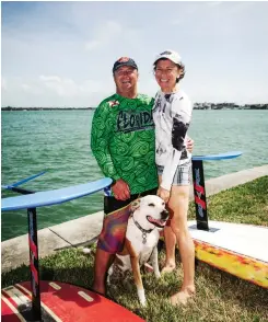  ??  ?? On a rare Sunday at home in February, between the Rolex Sydney Hobart and the Caribbean 600, Steitz launches foiling paddleboar­ds with his wife, Jamie, and the adopted family hound.