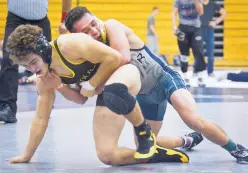  ?? MARLA BROSE/
JOURNAL ?? Atrisco Heritage’s Elijah Gabaldon, right, competes against Cibola’s Cody Baldonado during the APS Invite in December. The Joe Vivian Classic begins today at Albuquerqu­e High.