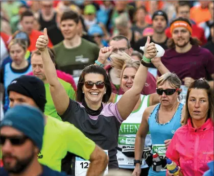  ??  ?? FEELGOOD FACTOR: Runners at the 2019 Dublin marathon... sport contribute­s to our physical and mental wellbeing