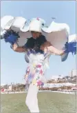  ??  ?? SHADY: Wearing an ocean inspired hat to the 1995 Durban July is Ondine Bellis. ARCHIVES