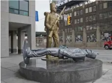  ?? TARA WALTON/TORONTO STAR FILE PHOTO ?? Douglas Coupland’s Monument to the War of 1812, at Fleet and Bathurst Sts., is one of more than 200 public art installati­ons across Toronto.