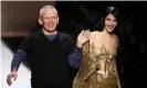  ?? Photograph: François Guillot/AFP via Getty Images ?? Jean-Paul Gaultier with a catwalk model at his spring/summer 2008 show in Paris.