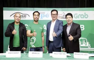  ??  ?? (L-R) Gines Barot, Expansion Head of Grab PH; Brian Cu, Head of Grab Philippine­s; Willy Tee Ten, President of Autohub Group and Lito Jose, Group General Manager of Motohub Group