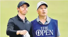  ??  ?? File photo shows Northern Ireland’s Rory McIlroy (left) stands with his caddie JP Fitzgerald during the third round. — Reuters photo