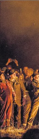  ??  ?? Villagers in Burghead, Moray cele brate The Burning of the Clavie, a festival dating back to the 1750s, when the Julian calendar was reformed in Britain and the new Gregorian calendar was introduce ed. Demanding back their 11 days, the people of Burghead rioted and now mark New Year twice – on January 1 and January 11