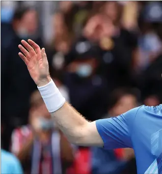  ?? ?? Andy Murray celebrates his win over Nikoloz Basilashvi­li after nearly four hours on court