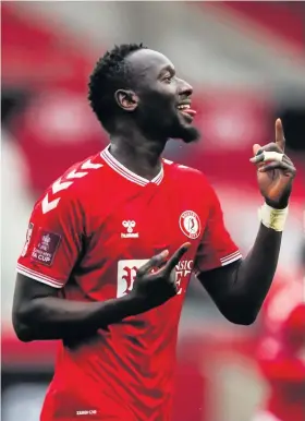  ??  ?? Famara Diedhiou celebrates scoring Bristol City’s opening goal