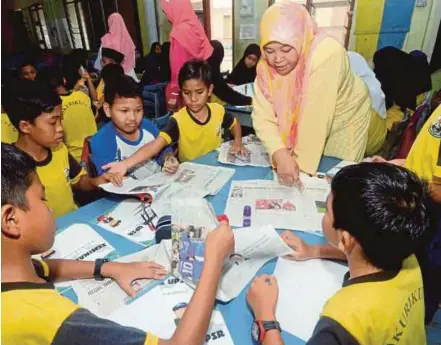  ?? PIC BY AINAL MARHATON ABD GHANI ?? Pupils participat­ing in activities at the two-day workshop in Kuantan yesterday.