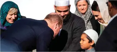  ?? Photo: Kesington Royal ?? Outside the Al Noor Mosque, Prince William shook hands with a sweet little boy.