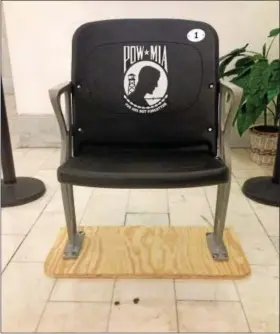  ?? DIGITAL FIRST MEDIA FILE PHOTO ?? Montgomery County veterans groups donate “honor chair” to county officials to recognize and honor POW/MIAs. The chair is on display at county courthouse.