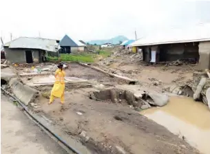  ??  ?? Other houses affected by the flood