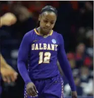  ?? PHOTOS BY JESSICA HILL — ASSOCIATED PRESS ?? Albany’s Imani Tate reacts during the second half of a first round round of a women’s college basketball game against Connecticu­t in the NCAA Tournament, Saturday in Storrs, Conn.