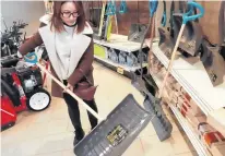  ?? STEPHEN COOKE • THE CHRONICLE HERALD ?? Bayers Lake Canadian Tire customer Iris Zhu shops for a shovel in preparatio­n for the winter weather ahead.