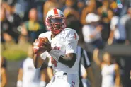  ?? ASSOCIATED PRESS FILE PHOTO ?? New Mexico quarterbac­k Sheriron Jones, who was indefinite­ly suspended earlier this week, is named in a UNM police report in which a student found Jones sitting in his vehicle with his genitals exposed.