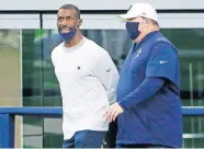  ?? FILE] ?? Cowboys strength and conditioni­ng coordinato­r Markus Paul, left, died Wednesday, a day after being taken to a hospital after experienci­ng a medical emergency at the team's facility. He was 54. [AP PHOTO/MICHAEL AINSWORTH,