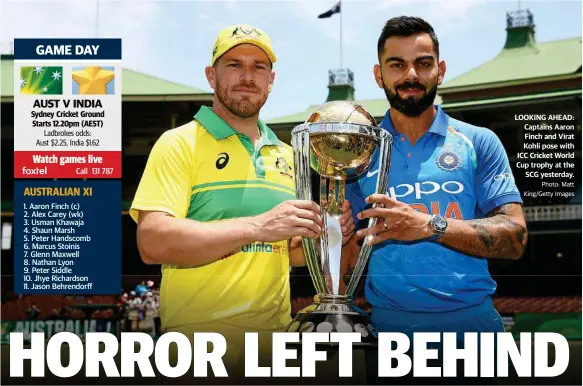  ?? Photo: Matt King/Getty Images ?? LOOKING AHEAD: Captains Aaron Finch and Virat Kohli pose with ICC Cricket World Cup trophy at the SCG yesterday.