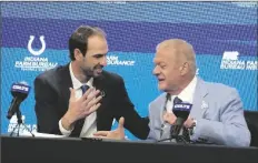  ?? DARRON CUMMINGS/AP ?? SHANE STEICHEN shakes hand with Indianapol­is Colts owner Jim Irsay during a news conference on Tuesday in Indianapol­is.