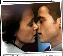  ??  ?? Passion: The stars share an on-screen kiss in BBC show