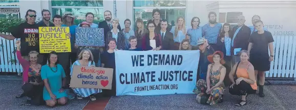  ??  ?? SUPPORTERS: A group of anti- Adani protesters outside Bowen’s courthouse yesterday, where fellow demonstrat­ors were fined.