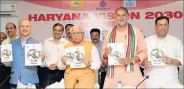  ?? HT PHOTO ?? Chief minister Manohar Lal Khattar released the Haryana Vision 2030 document in Chandigarh on Tuesday.