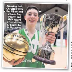  ??  ?? Amazing feat: CJ Fulton with the All Ireland schools Cup trophy and MVP award after hitting 47 points for St Malachy’s