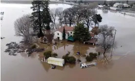  ?? Photograph: Josh Edelson/AFP/Getty Images ?? The massive storm has caused widespread flooding throughout the state.