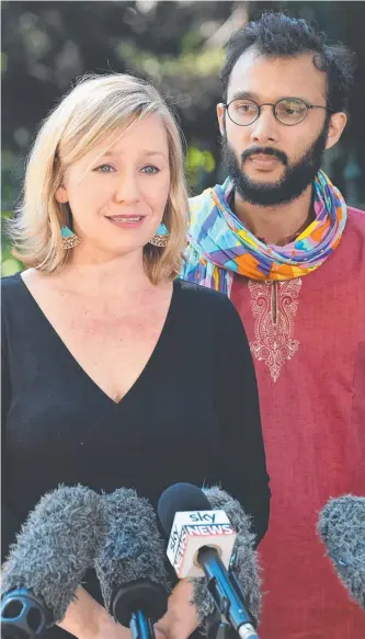  ?? Picture: AAP ?? Greens senator Larissa Waters resigns after discoverin­g she is a Canadian citizen, watched by Greens Brisbane City Councillor Jonathan Sri.