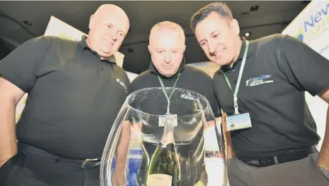  ??  ?? Sparkling are, from left, Gary Lorimer, Thomas Lorimer and Colin Heyburn from NewGlow Lighting.