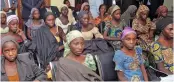  ??  ?? Chibok schoolgirl­s freed by Boko Haram.