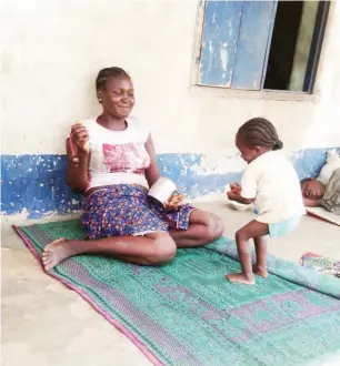  ??  ?? Little Erdoo dances as her mother sings at Agam IDP camp in Makurdi