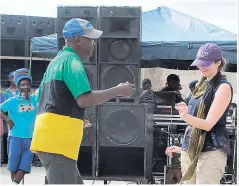  ??  ?? ‘Ebony’ and ‘Ivory’ trying to put some harmony into the steps at the Accompong Town celebratio­ns.