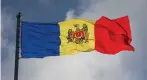  ?? (Vladislav Culiomza/Reuters) ?? A MOLDOVAN FLAG files on State Flag Day in Chisinau, Moldova.