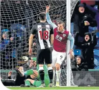  ??  ?? Burnley’s Chris Wood celebrates his goal