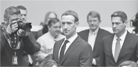  ?? JACK GRUBER/USA TODAY ?? Facebook CEO Mark Zuckerberg testified before Congress on April 11, denying accusation­s the social media company has a liberal bent.